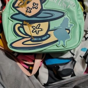 Disney park Alice in wonderland Epcot crossbody bag